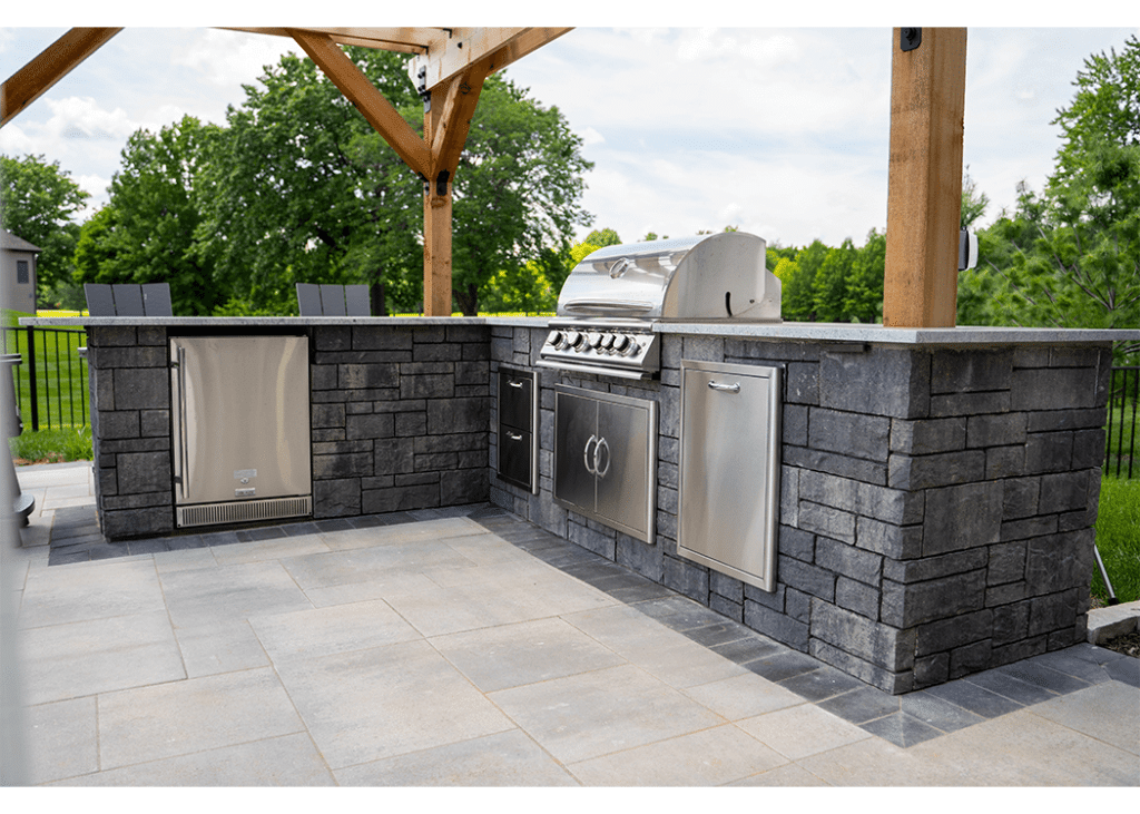 l-shaped brick outdoor kitchen